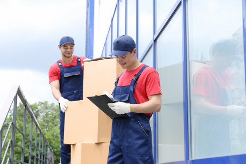Removal team planning a Shoreditch move near busy streets and flats