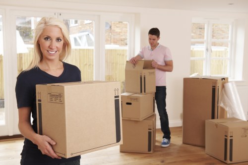 Removal team loading household items for a Shoreditch home move