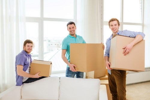 Shoreditch moving team loading boxes and furniture carefully