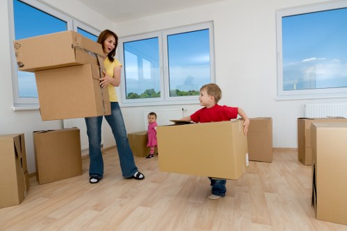 Furniture being carried from a Shoreditch apartment building