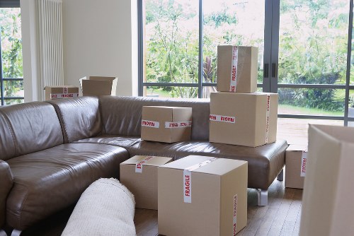 Loading boxes and furniture into a local removal van